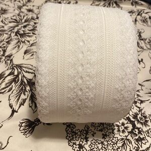 Roll of white lace ribbon